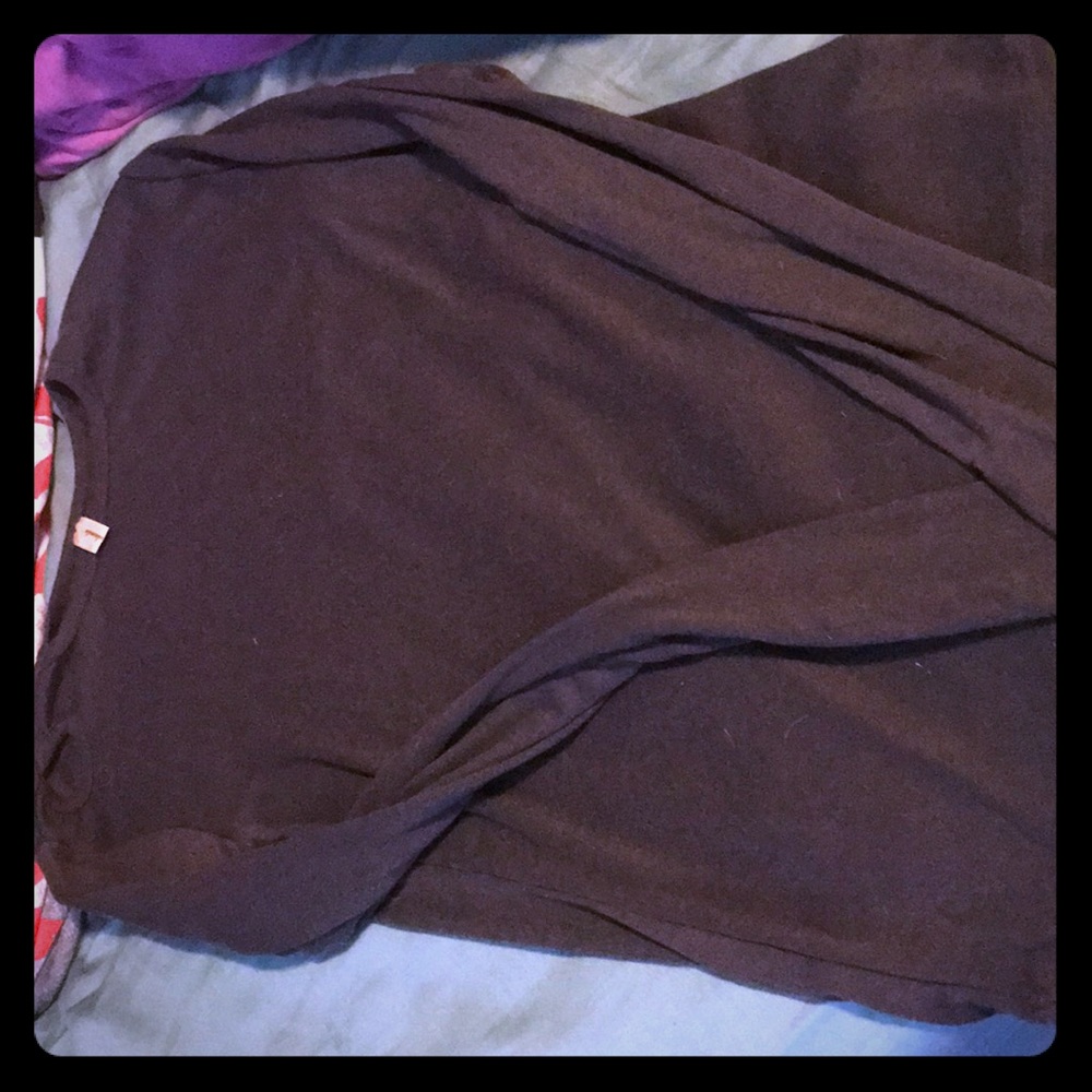 A dark greyish brown long sleeve shirt